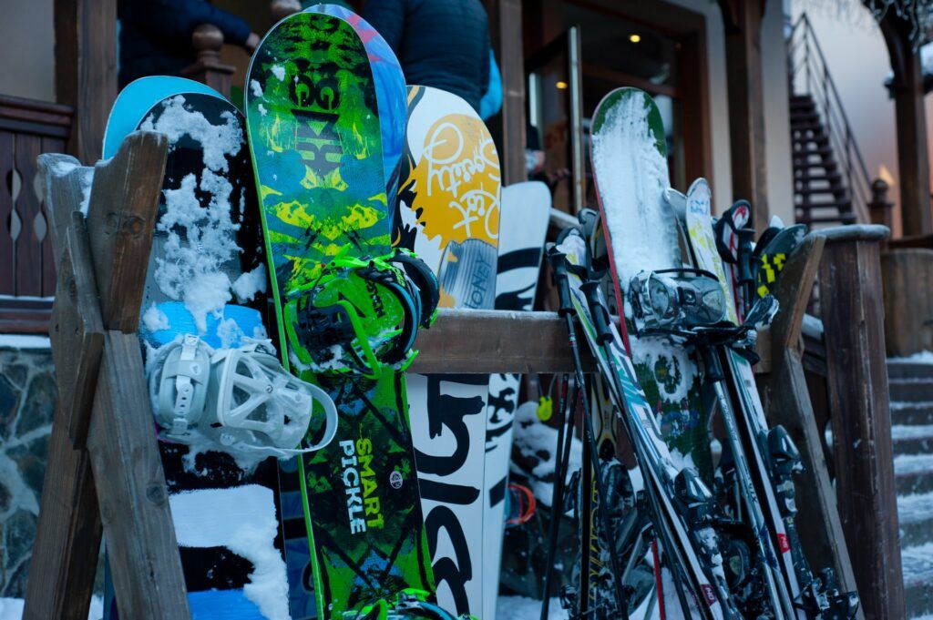skiing - online ski business - rack full of snowboards