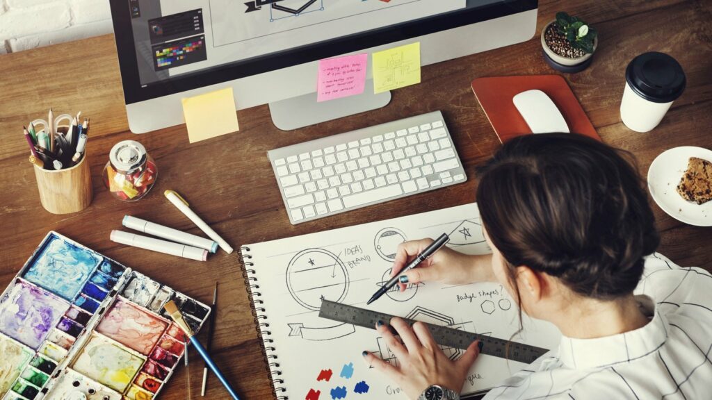 graphic designer hard at work at her desk
