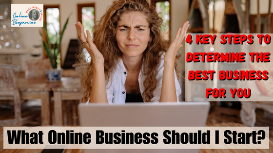 What online business should I start - Lady sitting at the table staring at her laptop holding her hands up not knowing what to choose.