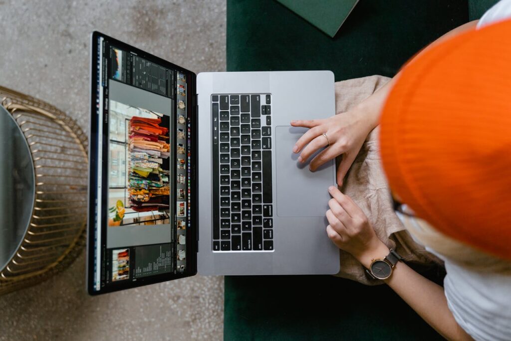 reselling products online - man at his computer doing market research on what products to resell online.