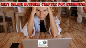 Woman at her desk with her head in her hands staring at her laptop looking for the best online business courses for beginners