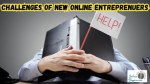 Challenges for new online entrepreneurs - Image of a man with his head down on his desk and his laptop open and draped over his head.