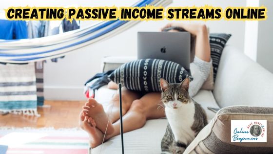 Passive income online - image of lady lounging on her couch looking at her laptop with her caat at her feet.