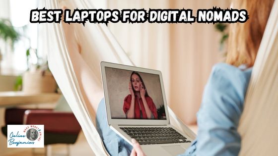 A lady sitting in a hammock working on her laptop computer