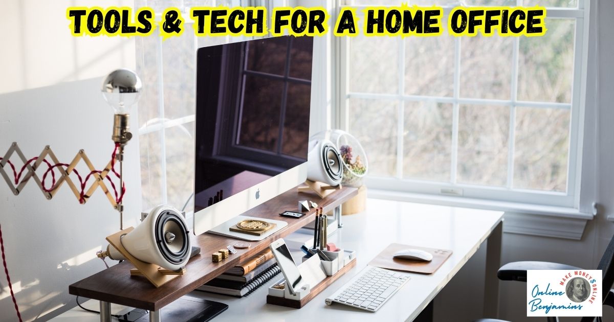 Tools and Tech for a Remote Office featured image with an office set up showing desktop computer, microphone, speakers, and phone holder.