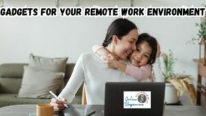 Smart Gadgets to Enhance Your Remote Work Environment featured image showing a little girl hugging her mom from behind as the mom works at her laptop from home.