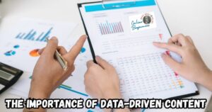 The Importance of Data-Driven Content featured image showing two people discussing a set of tables and graphs.