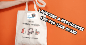 Benefits of launching a Merchandise Line for Your Brand featured image showing a handbag with website and logo.